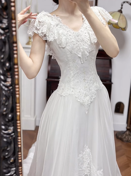 Ivory Vintage Wedding Gown, V‑Neck Lace Flutter Sleeves, Lace Appliqué Fitted Waist, Flowy Multi‑Layer Tulle Skirt, Lace Appliqué Details, Multi‑Tier Lace Hem, Long Lace Train, Bridal Prom Dress gh8733