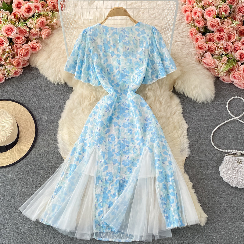 Robe trapèze en mousseline de soie à col en V et mailles cousues en mailles bleues 3219