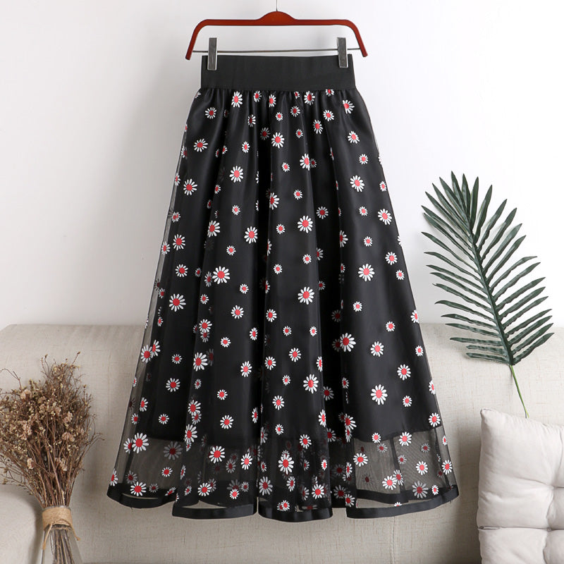 Jolie petite jupe trapèze à motif marguerite 3449