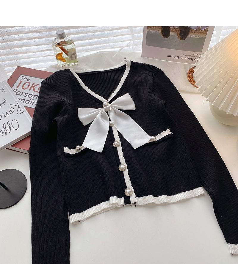 Xiaoxiangfeng V-neck color matching bow knit 6632
