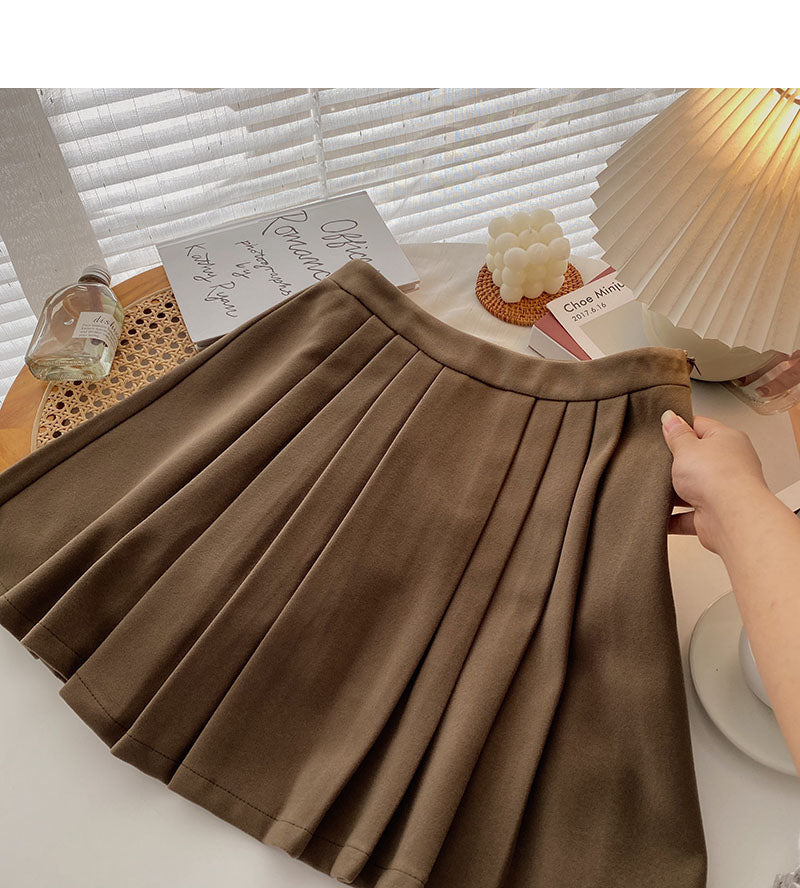 Korean version of high waist and small man, fashionable, thin, hip covering skirt 5447