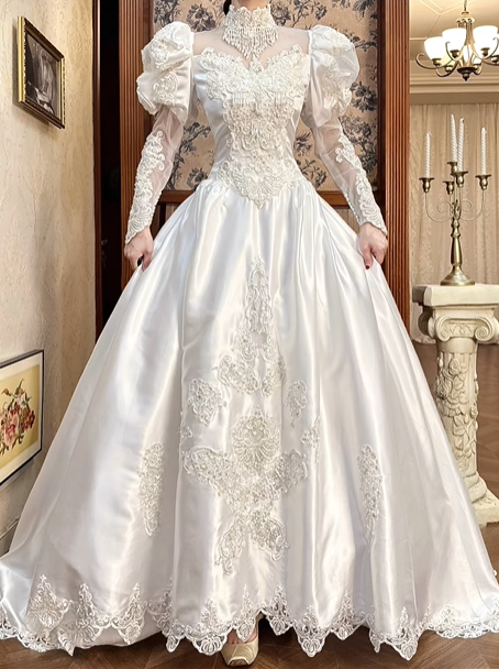 White Vintage Satin Wedding Ball Gown, Tassel Fringe Illusion High Neck Over Sweetheart Neck, Puff Long Sleeves With Sheer Lace Lower Arms, Heavy Lace Beaded Appliqué Pointed Waist, Voluminous A‑Line Skirt With Scalloped Lace Hem, Prom Dress gh8653