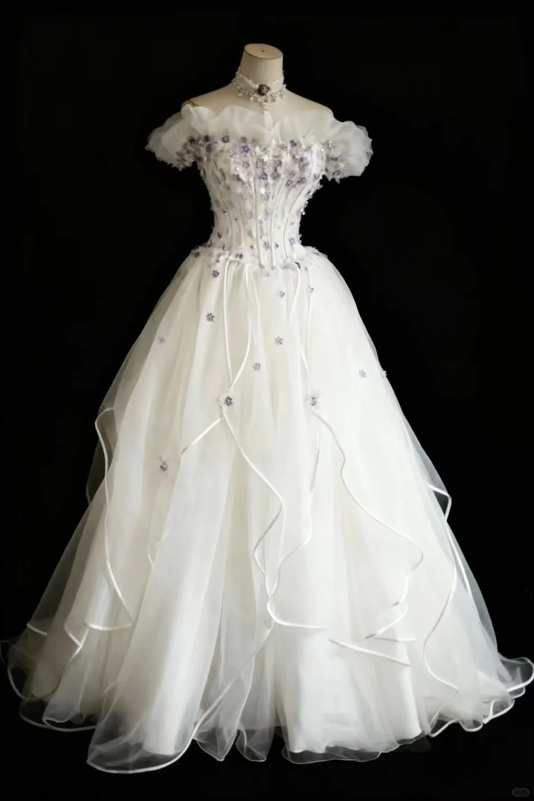 Off‑the‑Shoulder Ball Gown Wedding Dress, Puff Short Sleeve Corset Bodice 3D Purple Floral Applique Ruffled Satin‑Trim Tulle Skirt Bridal Gown gh9117