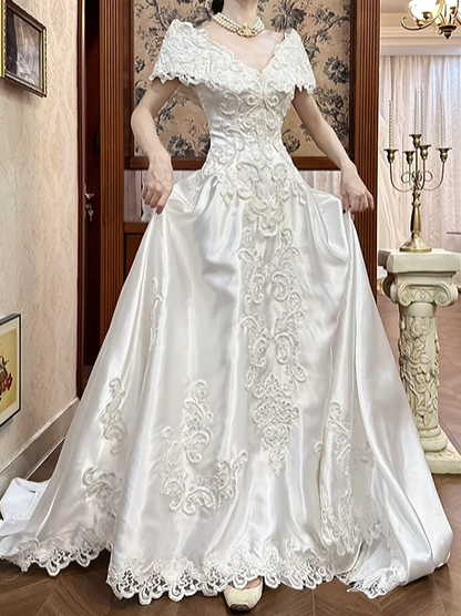 White Vintage Satin Ball Gown Wedding Prom Dress, V‑Neck Lace Cape Sleeves, Baroque Lace Appliqués, A‑Line Long Train gh8696