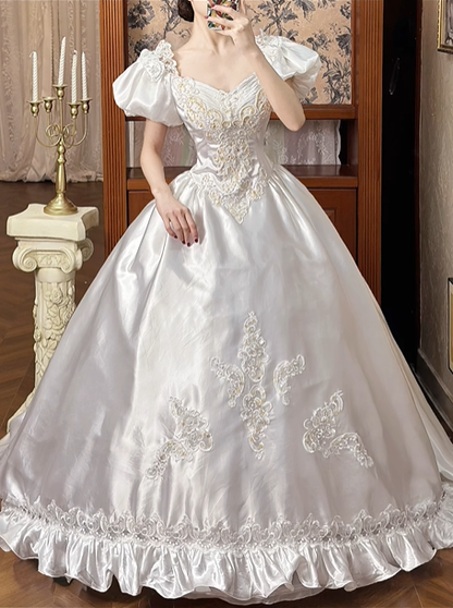 White Vintage Satin Wedding Ball Gown, Sweetheart Square Neck, Short Puff Sleeves, Gold‑Thread Lace Appliqué Pointed Waist, Voluminous A‑Line Skirt With Ruffle Lace Hem, Prom Dress gh8649