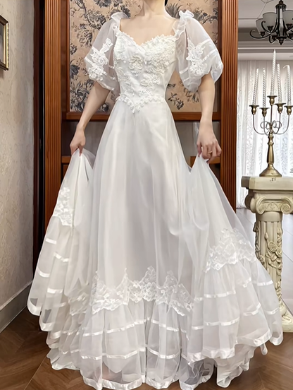 White Vintage Tulle A‑Line Wedding Prom Dress, Sweetheart V‑Neck Ruffle Puff Sleeves, 3D Floral Lace Appliqués, Tiered Cake Hem gh8707
