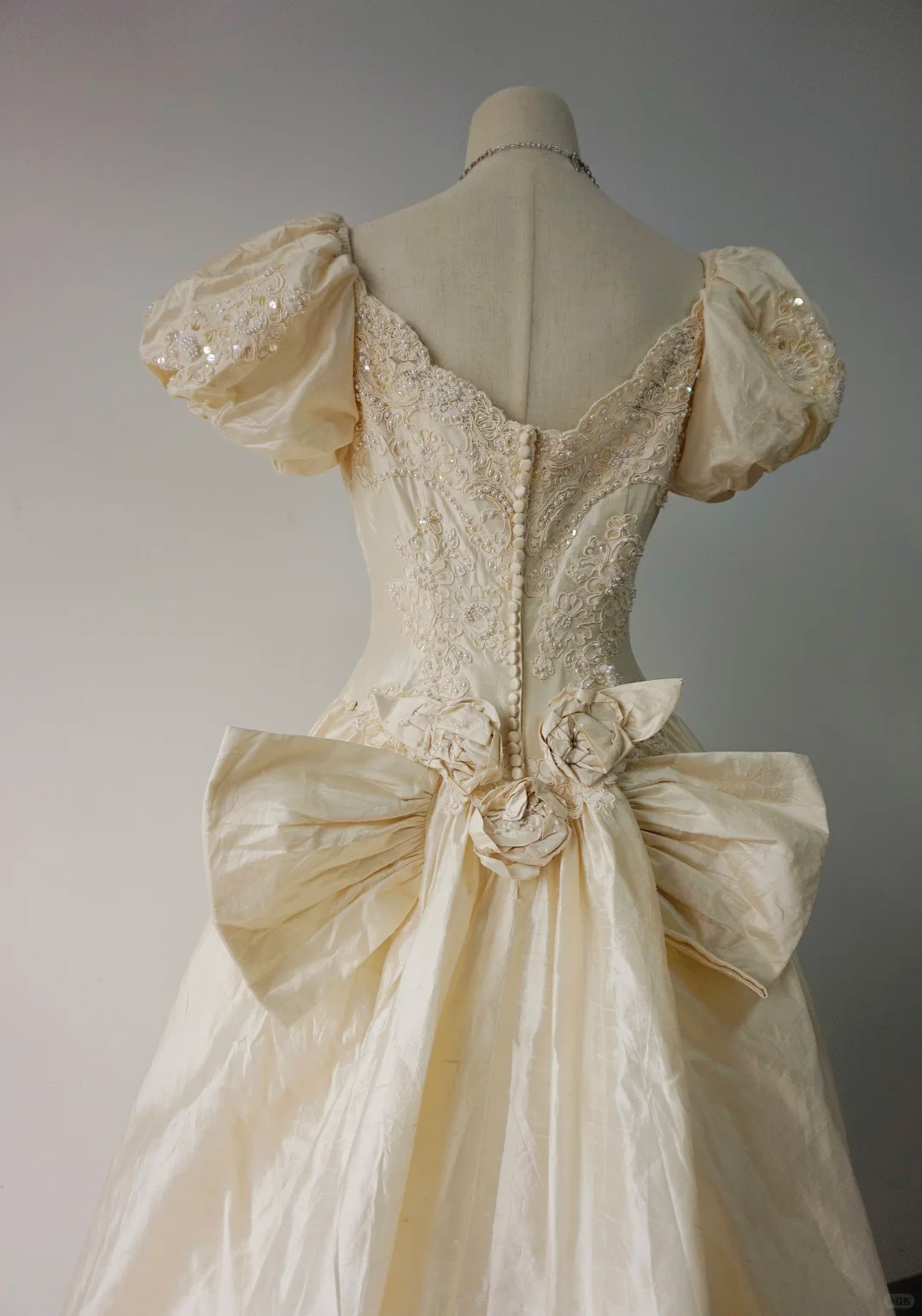Light Champagne Vintage Wedding Gown, V‑Neck Puff Short Sleeves, Heavy Beaded Sequin Floral Lace Applique, Large Back Satin Bow, Satin Ball Gown Skirt, Bridal Prom Dress gh8914