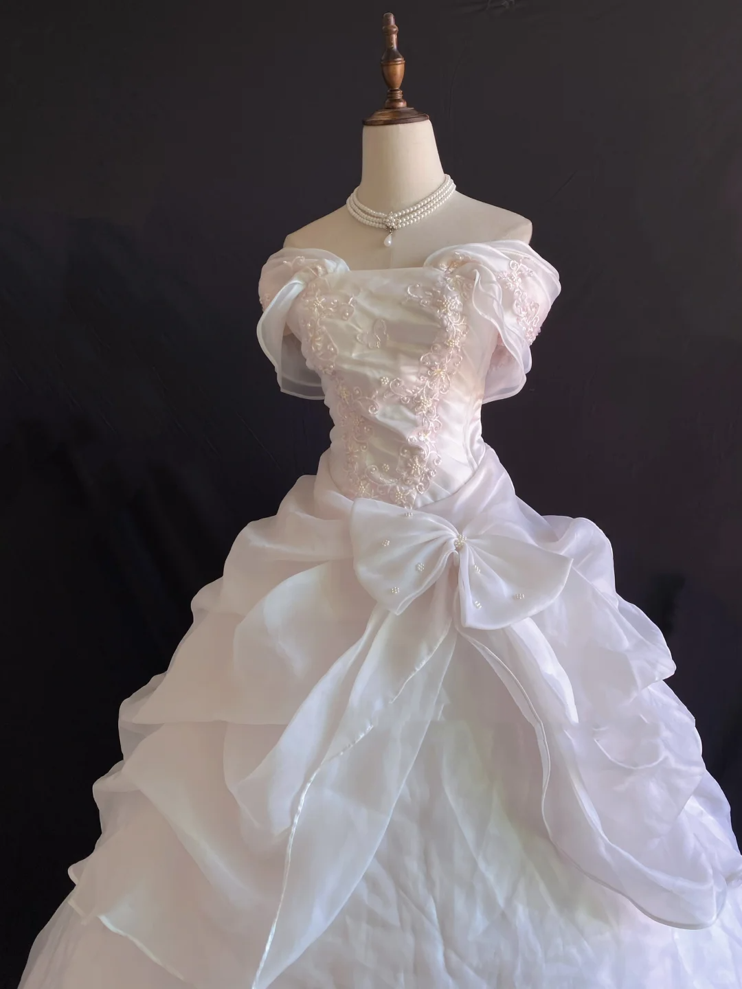 Blush pink off-the-shoulder romantic gown with fitted waist and voluminous princess skirt, wedding dress & bridal gown gh8248