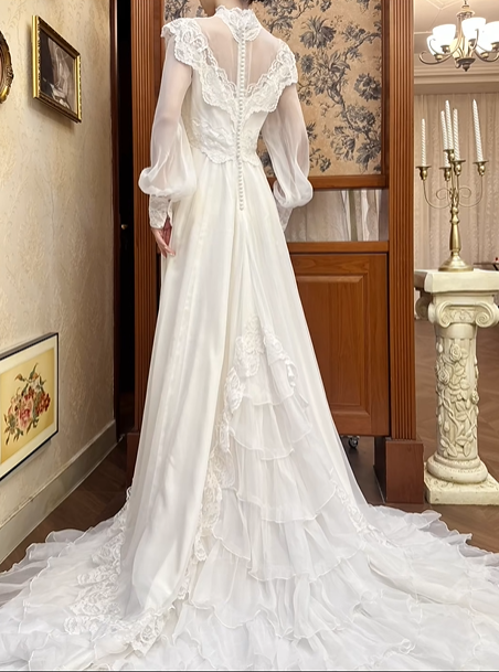 White Vintage Chiffon Wedding Gown, Lace High Neck Over V‑Neck, Ruffle Lace Shoulder Trim, Chiffon Puff Long Sleeves, Lace Embroidered Cuffs, Lace Appliqués Empire Waist, A‑Line Long Skirt With Multi‑Layer Ruffle Lace Hem, Prom & Wedding Dress gh8668