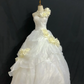 Off-White One-Shoulder Romantic Wedding Dress with Floral Details, Cinched Waist, Voluminous Princess Skirt gh8315
