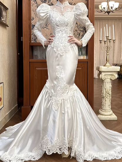 White Vintage Satin Mermaid Wedding Prom Dress, Lace High Neck Illusion V‑Neck, Leg‑of‑Mutton Puff Sleeves, Heart‑Shape Lace Appliqués, Scalloped Lace Long Train gh8680