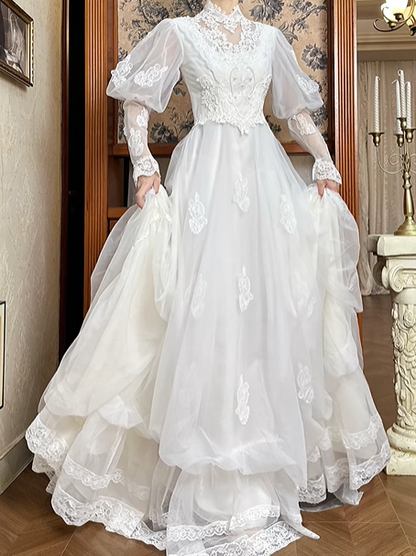 White Vintage Tulle Wedding Gown, Lace High Neck Over V‑Neck, Lantern Puff Long Sleeves, Lace Appliqués Fitted Waist, Scattered Floral Lace Appliqués On Skirt, Multi‑Layer Tulle A‑Line Long Skirt With Multi‑Tier Lace Hem, Prom & Wedding Dress gh8667