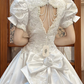 White Vintage Satin Ball Gown Wedding Prom Dress, V‑Neck Puff Sleeves, 3D Flowers Bows, Multi‑Tier Ruffle Cake Hem gh8713