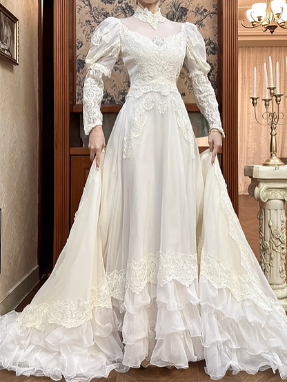 Ivory Vintage Tulle Wedding Prom Dress, Lace High Neck Illusion V‑Neck, Leg‑of‑Mutton Puff Sleeves, Lace Appliqués, Multi‑Tier Ruffle Cake Skirt gh8677