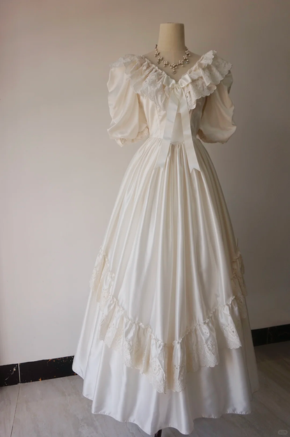 Ivory Satin Vintage Wedding Gown, V‑Neck Lace Ruffled Off‑the‑Shoulder, Puff Short Sleeves, Large Satin Bow, Tiered Eyelet Lace Ruffle Skirt, Bridal Prom Dress gh8913