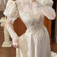 Champagne Vintage Satin Wedding Gown, Illusion Lace High Neck Over Sweetheart Neck, Puff Shoulder Lace Long Sleeves, Gold‑Thread Lace Appliqué Pointed Waist, A‑Line Satin Long Train With Ruffle Lace Hem, Prom Dress gh8651
