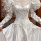 Ivory Vintage Satin Wedding Gown, Illusion Square Neck, Dramatic Puff Shoulder Combined Long Sleeves, Lace Appliqué Fitted Waist, Satin 3D Floral Embroidered Full Skirt, Ruffled Hem, Bridal Prom Dress gh8727