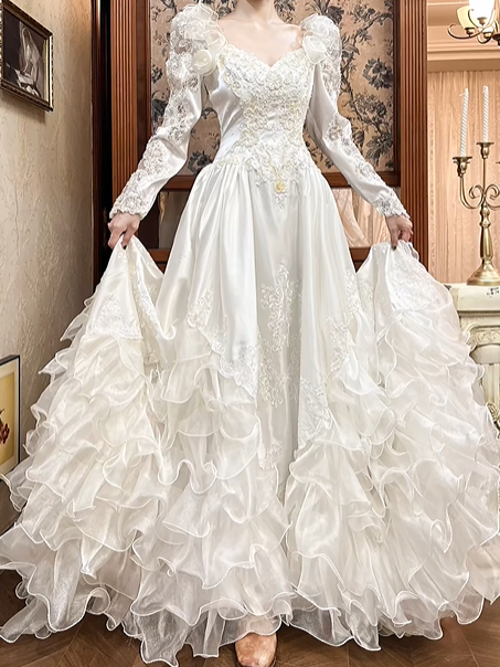 White Vintage Satin Ball Gown Wedding Prom Dress, V‑Neck, 3D Floral Shoulders, Leg‑of‑Mutton Long Sleeves, Multi‑Tier Ruffled Cake Skirt gh8685