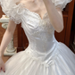 White Vintage Tulle Ball Gown Wedding Prom Dress, V‑Neck Ruffled Puff Sleeves, Lace Beaded Tassel Bodice, Multi‑Layer Curled Ruffle Cake Skirt gh8698