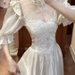 White Vintage Satin Ball Gown Wedding Prom Dress, Mock Two‑Piece Lace High Neck V‑Neck, Puff 3/4 Sleeves, Satin Bows, Double‑Layer Lace Hem gh8697