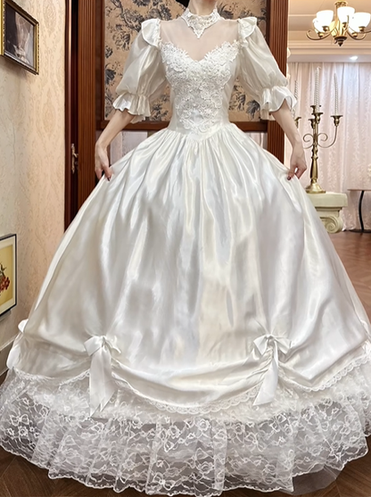 White Vintage Satin Ball Gown Wedding Prom Dress, Mock Two‑Piece Lace High Neck V‑Neck, Puff 3/4 Sleeves, Satin Bows, Double‑Layer Lace Hem gh8697