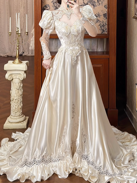 Champagne Vintage Satin Wedding Gown, Illusion Lace High Neck Over Sweetheart Neck, Puff Shoulder Lace Long Sleeves, Gold‑Thread Lace Appliqué Pointed Waist, A‑Line Satin Long Train With Ruffle Lace Hem, Prom Dress gh8651