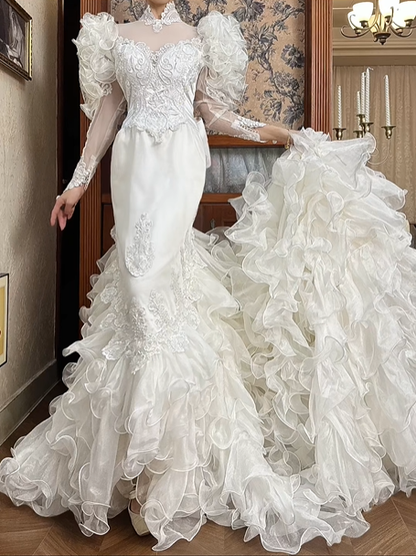 White Vintage Mermaid Wedding Gown, Mock Neck Illusion Tulle Sweetheart Neck, 3D Ruffle Puff Shoulders, Sheer Lace Long Sleeves, Embroidered Lace Appliqués Fitted Bodice, Multi‑Layer Ruffle Mermaid Long Train, Prom Dress gh8661