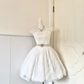White Lace Short Wedding Cocktail Dress, Cap Sleeve Round Neck With Rhinestone Accent Multi‑Row Pearl Ornate Sash Voluminous A‑Line Homecoming Party Gown gh9250