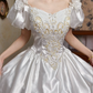 White Vintage Satin Wedding Ball Gown, Sweetheart Square Neck, Short Puff Sleeves, Gold‑Thread Lace Appliqué Pointed Waist, Voluminous A‑Line Skirt With Ruffle Lace Hem, Prom Dress gh8649