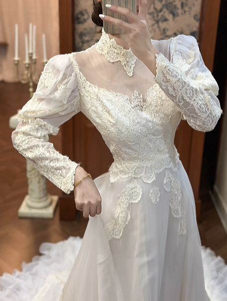Ivory Vintage Tulle Wedding Prom Dress, Lace High Neck Illusion V‑Neck, Leg‑of‑Mutton Puff Sleeves, Lace Appliqués, Multi‑Tier Ruffle Cake Skirt gh8677