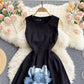 Robe trapèze noire à col rond et à la mode 571 