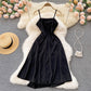 Schwarzes unregelmäßiges Kleid in A-Linie Modekleid 391