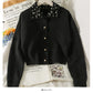 Pull cardigan slim à simple boutonnage avec revers perlés 2034