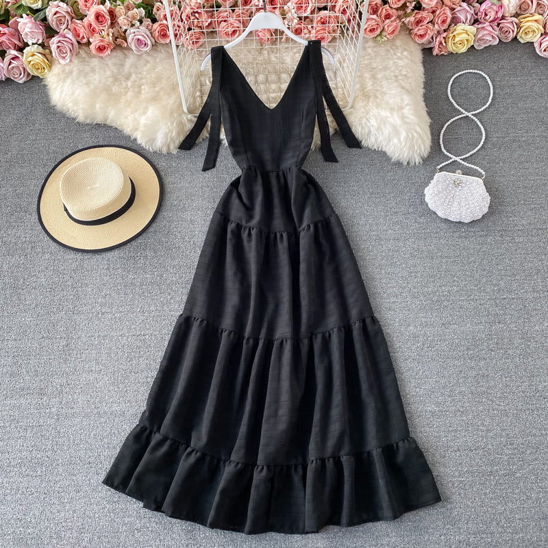Robe de vacances à la mer avec col en V et dos nu 2935