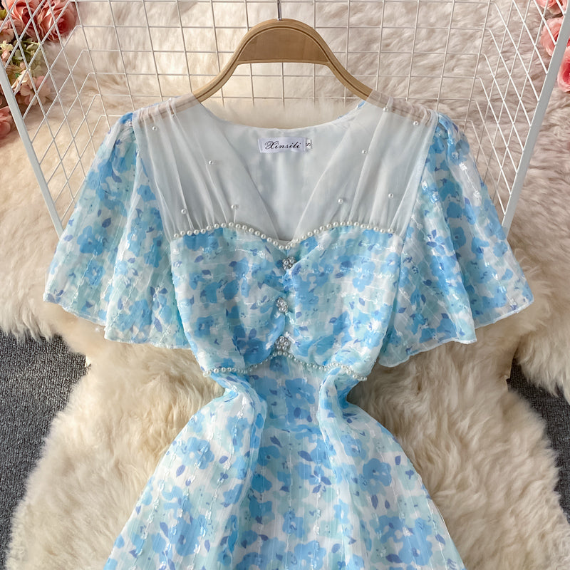 Robe trapèze en mousseline de soie à col en V et mailles cousues en mailles bleues 3219