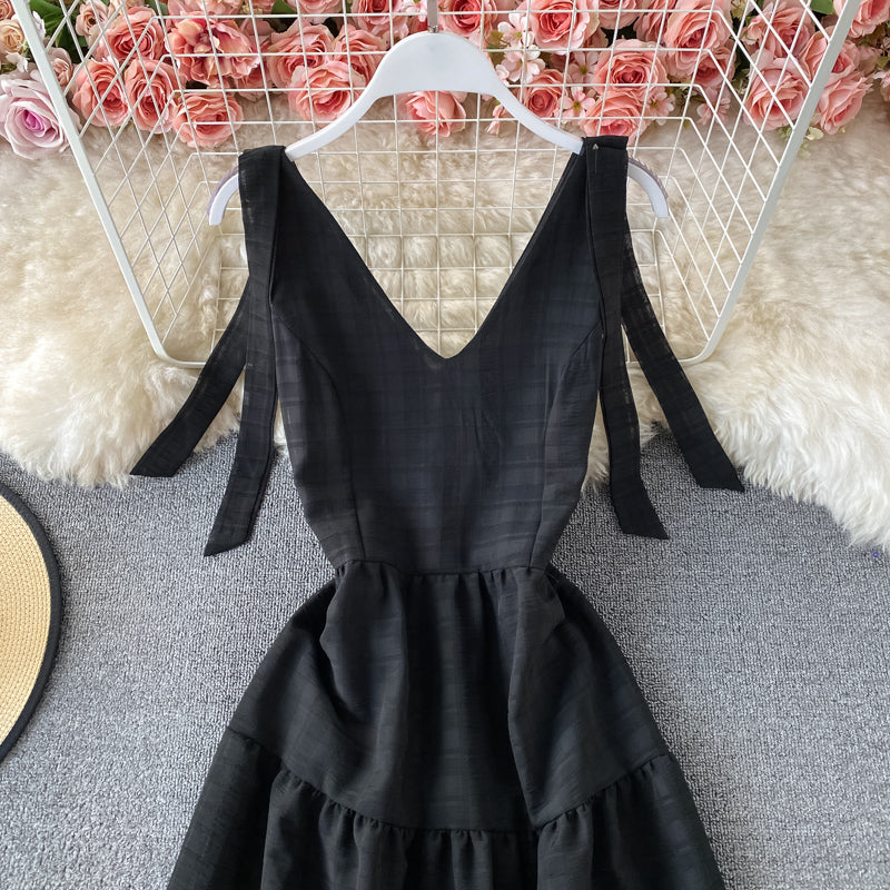 Robe de vacances à la mer avec col en V et dos nu 2935
