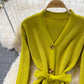 Robe en tricot à col en V de style doux, jupe pull fine et tempérament 3379