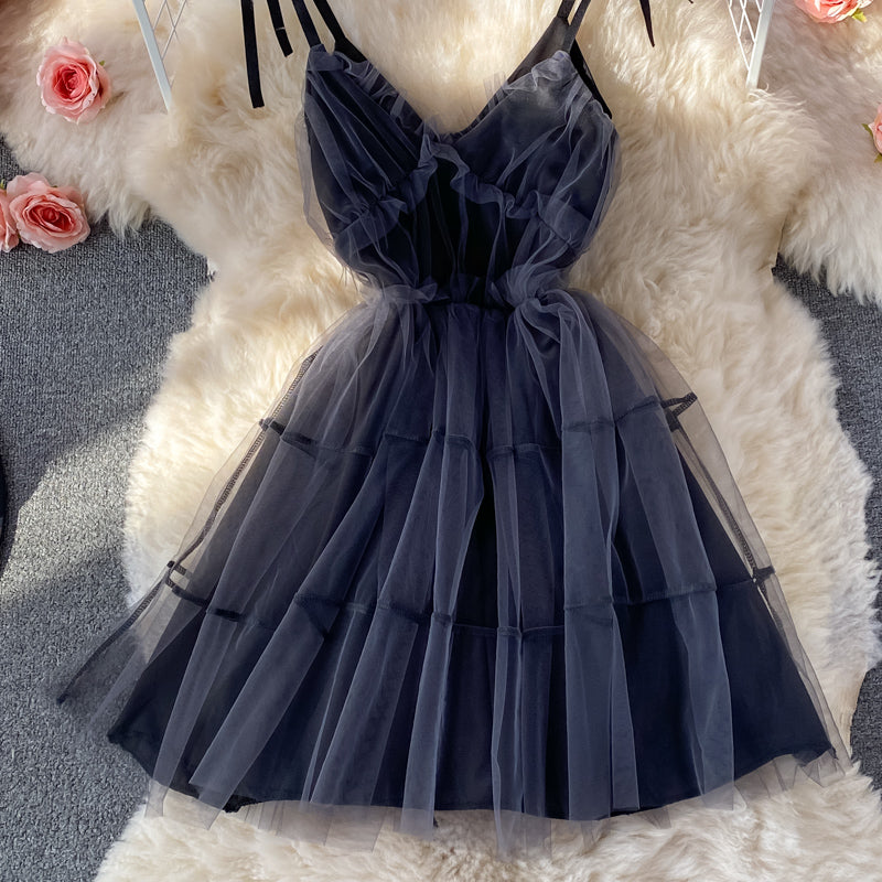 Robe bouffante en maille fine avec nœud papillon et fermeture à la taille 3071