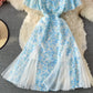 Robe trapèze en mousseline de soie à col en V et mailles cousues en mailles bleues 3219