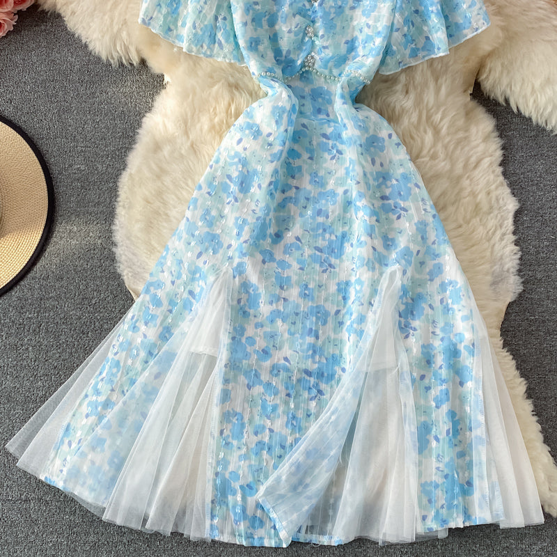 Robe trapèze en mousseline de soie à col en V et mailles cousues en mailles bleues 3219