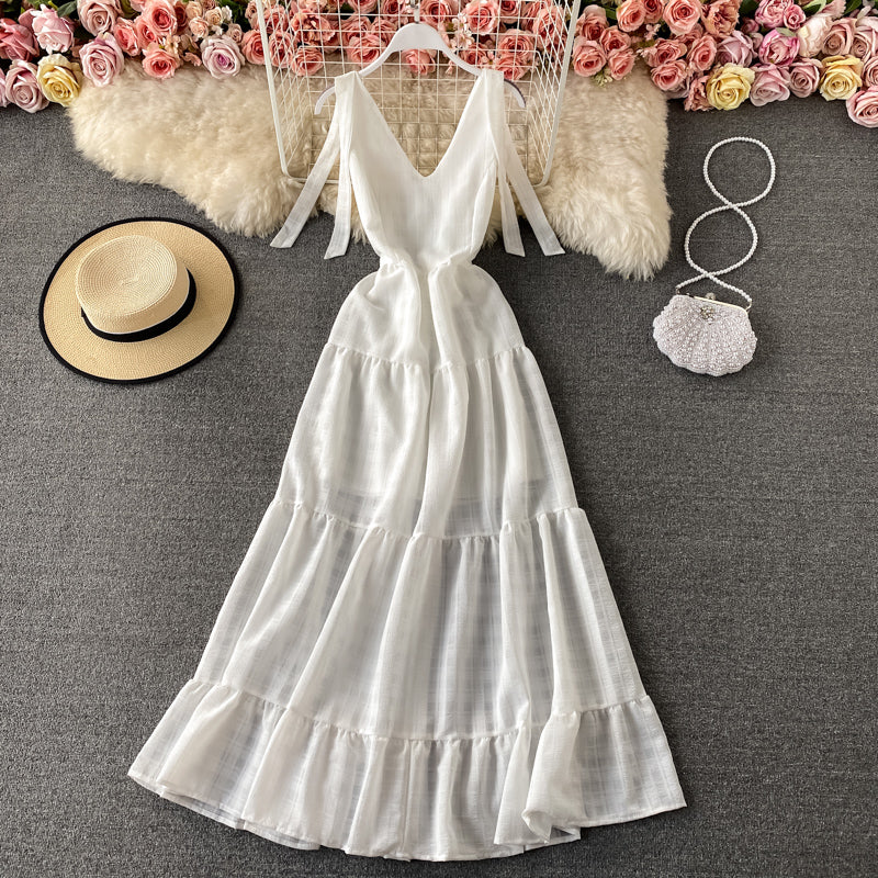 Robe de vacances à la mer avec col en V et dos nu 2935