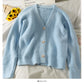 Pull cardigan simple boutonnage ample et fin à trois boutons de Han Fan 1784