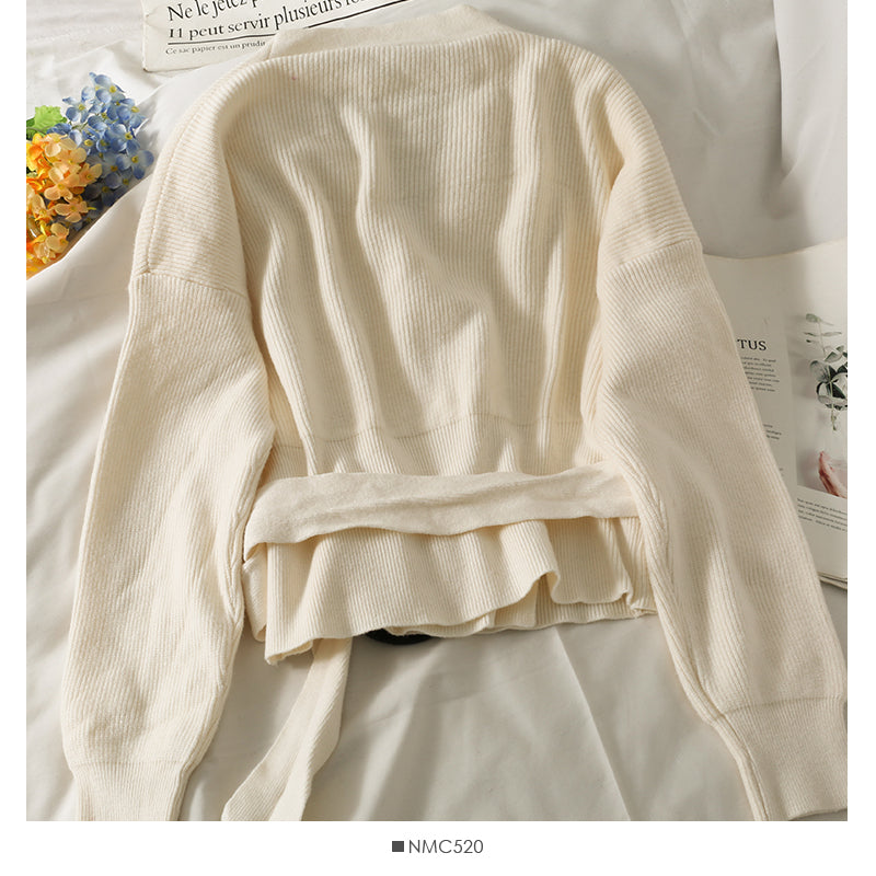 Pull à manches longues et col en V croisé de conception de niche française 1972