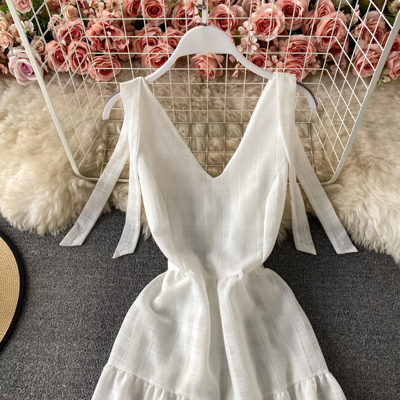 Robe de vacances à la mer avec col en V et dos nu 2935