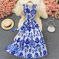Robe à col ras du cou sans manches à volants en porcelaine bleue et blanche imprimée 2981 