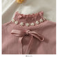 Pull col montant avec nœud papillon et perles Sweet Wind 1822