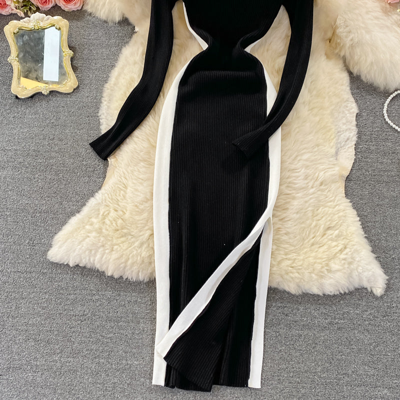Robe mi-longue en maille extensible serrée à col rond et manches longues fendues 3381