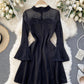 Robe noire à manches longues coupe A 1299