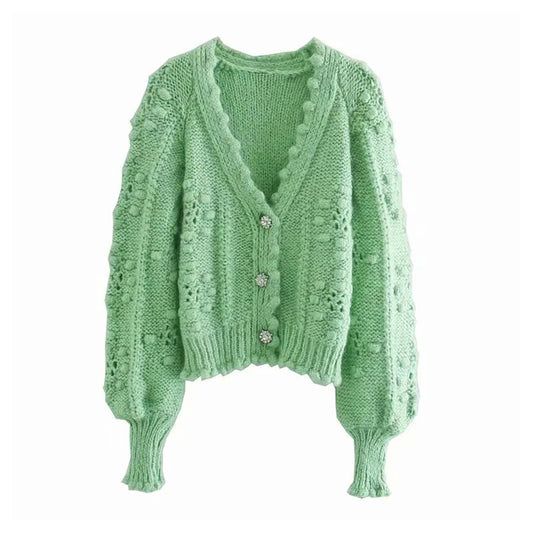 Nouveau cardigan tricoté à boutons artificiels creux sphériques 7253
