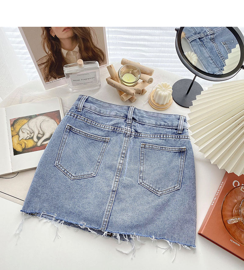 Korean version light proof personalized hole breaking high waist A-shaped skirt  5567